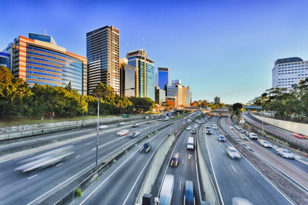 Cityscape of freeway going toward city